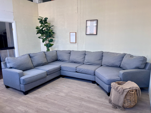 FREE DELIVERY! 🚚 - Jordan’s Furniture Gray Deep-Seated Modern U Sectional Couch with Cuddle Corner