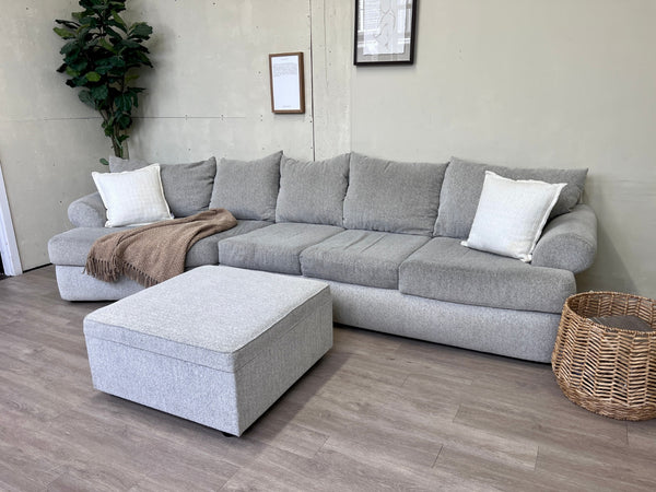 WE DELIVER! 🚚 - Jordan’s Furniture Light Gray Modern Deep-Seated Sectional L Couch with Cuddle Corner & Ottoman Set