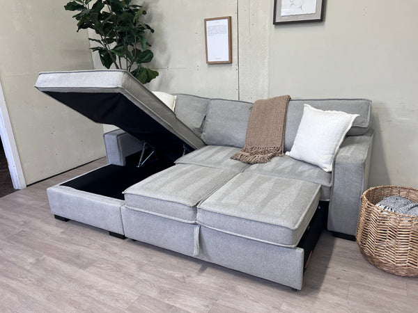 Bob’s Furniture “Playscape” Light Gray Modern Sleeper Sectional Couch with Storage Chaise